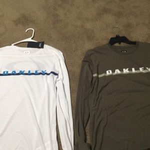 Two Oakley long sleeves